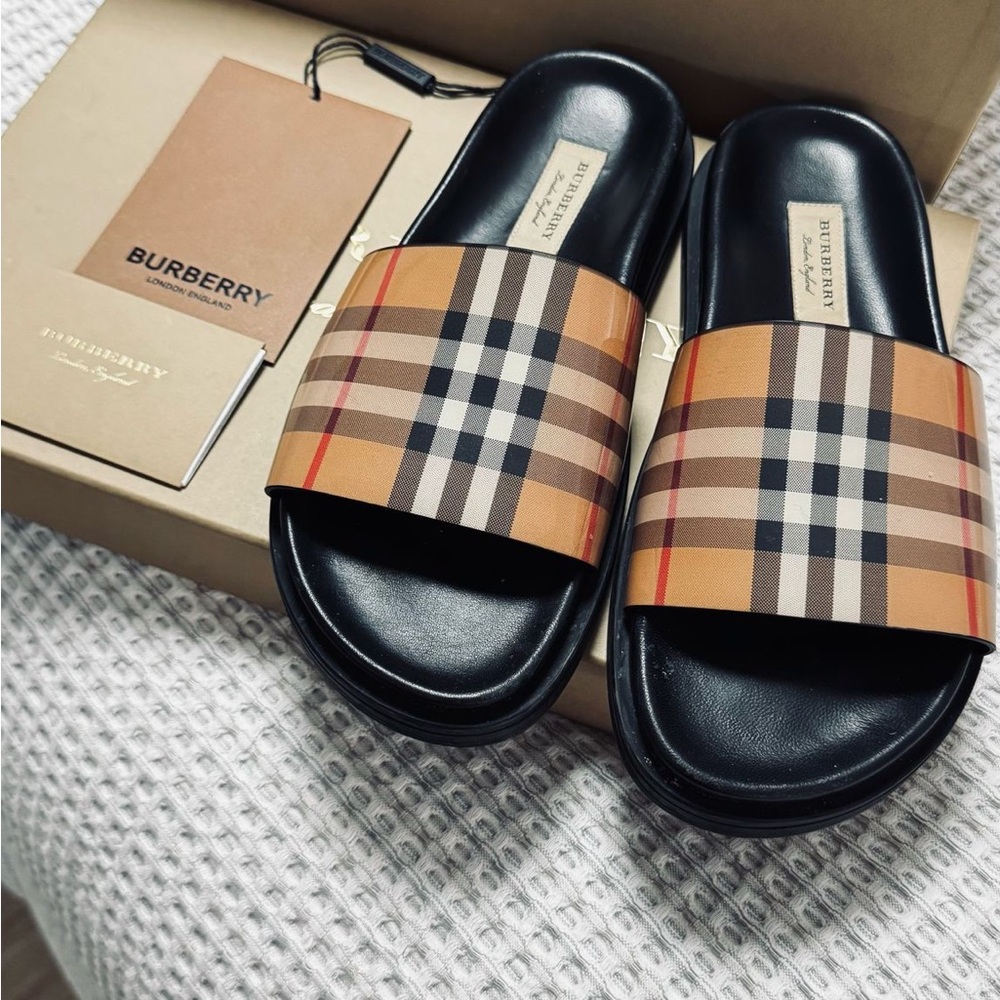 Burberry woman’s Black and Tan Slides